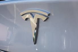 Tesla shares fall on weaker electric vehicle deliveries