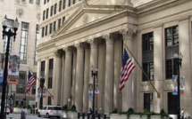 US Fed increases rate but lowers expectations