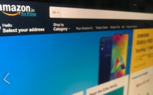 Amazon cuts investment in India
