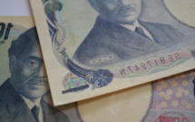 Bank of Japan revises GDP and inflation forecasts