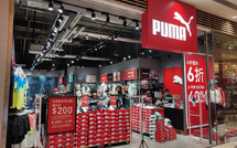 Puma shares fall 20% after reporting a profit loss